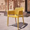 Boom Armchair in Mustard Shown Outside